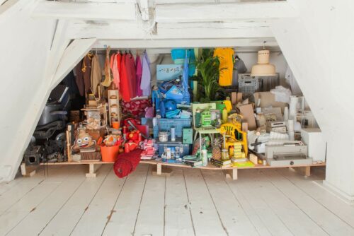 Image of a cluttered room showing a need for storage